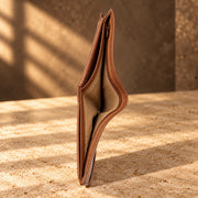 CRAFT tan coin pocket flip-id bifold wallet, side profile