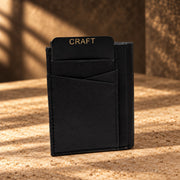 CRAFT black cross-slot quick-access bifold wallet, standing exterior view